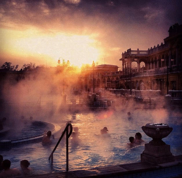 Why should you visit the Széchenyi thermal bath in Budapest?