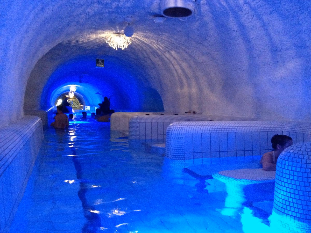 What is the temperature of the water in the cave?