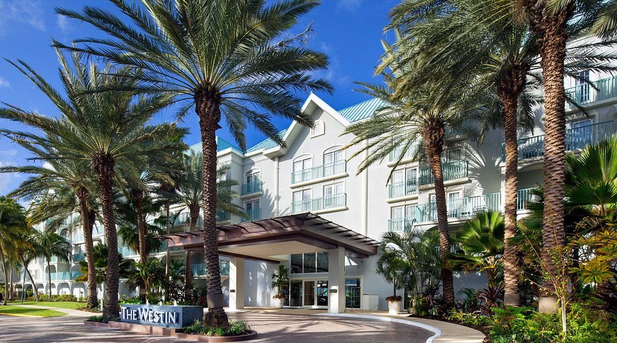 What time is check-in at the Westin Grand Cayman Seven Mile Beach?